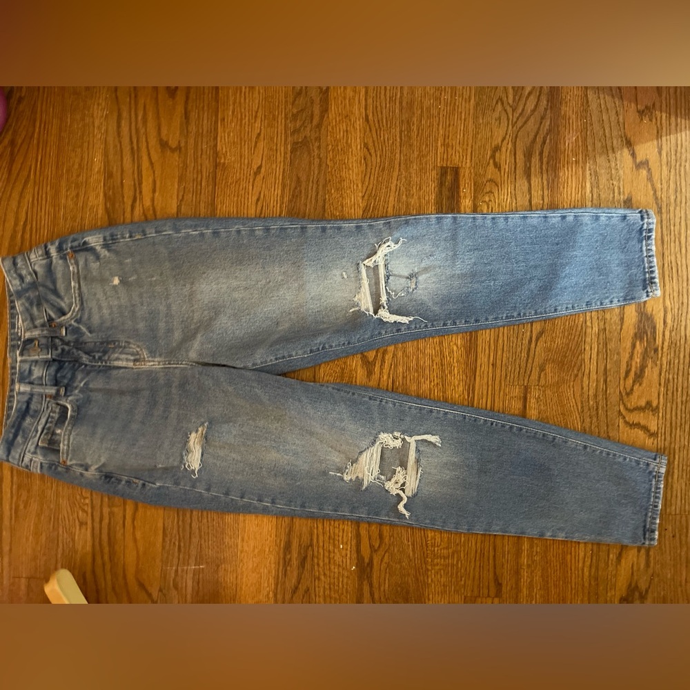 Woman’s  Blue Distressed Jeans